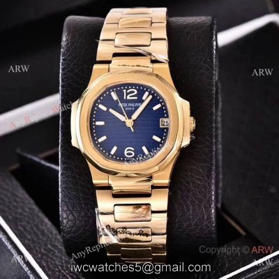 Copy Patek Philippe Nautilus Womens Yellow Gold and Blue Swiss Quality watches