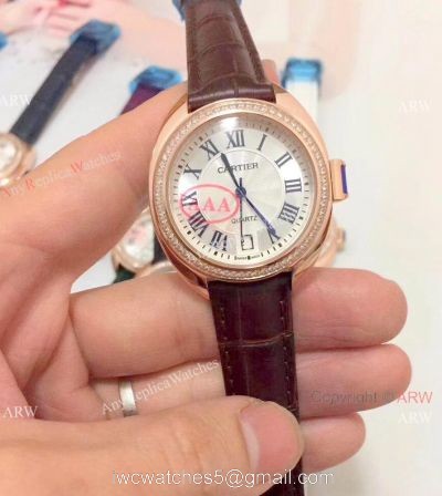 Fake Cle de Cartier Roman Dial Rose Gold Diamond watch Women Size watches