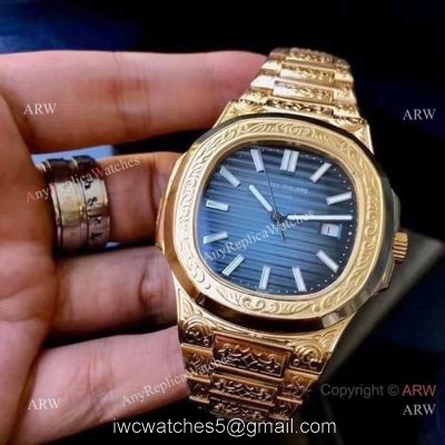 Patek Philippe Nautilus Replica Watches Yellow Gold Blue Dial watches