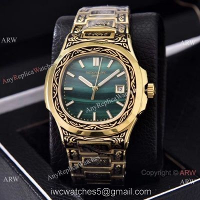 Clone Patek Philippe Nautilus Gold Tattoo Wrist Malachite Green Dial watches