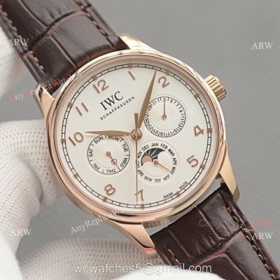 Replica IWC Portuguese Moonphase Gold Case White Face Watch watches