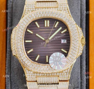 Swiss AAA Replica Patek Philippe Nautilus Iced Out Yellow Gold Watch 40mm 9015 Ultra-thin Movement watches