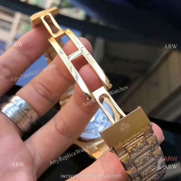 Patek Philippe Nautilus Replica Watches Yellow Gold Blue Dial Patek Philippe Nautilus Replica Watches Yellow Gold Blue Dial