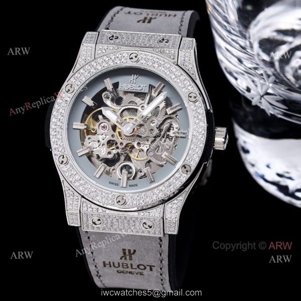 Replica Hublot Big Bang 45mm Skeleton Watch With Diamonds Blue Rubber Band For Men Replica Hublot Big Bang 45mm Skeleton Watch With Diamonds Blue Rubber Band For Men