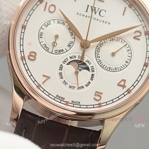 Replica IWC Portuguese Moonphase Gold Case White Face Watch Replica IWC Portuguese Moonphase Gold Case White Face Watch
