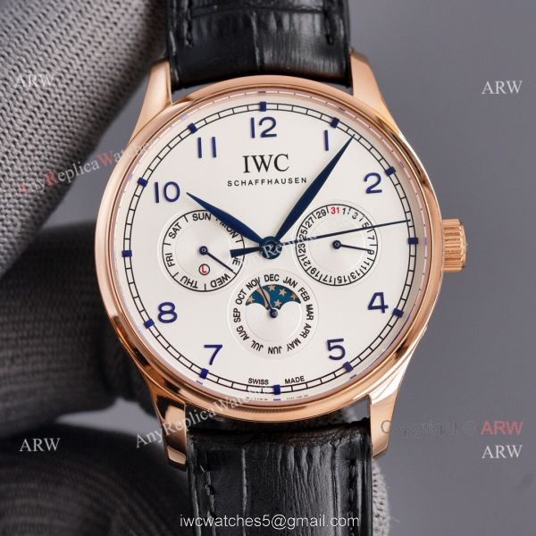Fake IWC Portuguese Moonphase Rose Gold Case 42MM Brown Leather Strap Watch Fake IWC Portuguese Moonphase Rose Gold Case 42MM Brown Leather Strap Watch