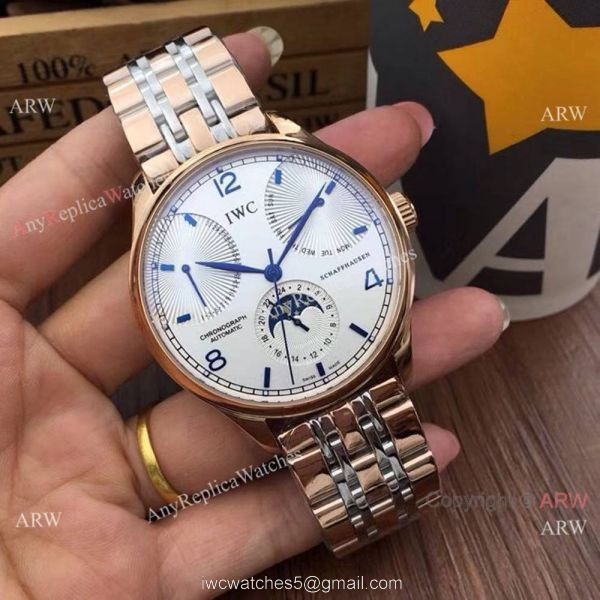 Replica IWC Portuguese Black Face Watch Two Tone Rose Gold Moonphase Replica IWC Portuguese Black Face Watch Two Tone Rose Gold Moonphase