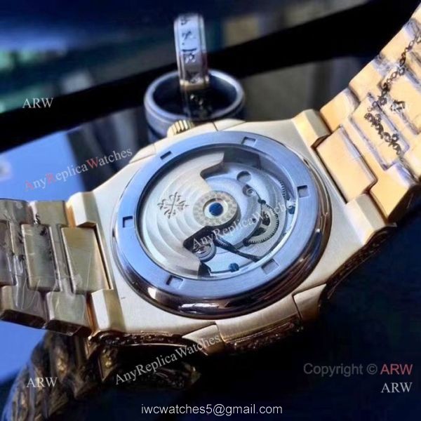 Patek Philippe Nautilus Replica Watches Yellow Gold Blue Dial Patek Philippe Nautilus Replica Watches Yellow Gold Blue Dial