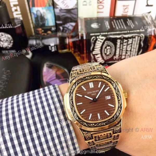 2019 Copy Patek Philippe Engraving Nautilus Watches Yellow Gold Black Dial 2019 Copy Patek Philippe Engraving Nautilus Watches Yellow Gold Black Dial