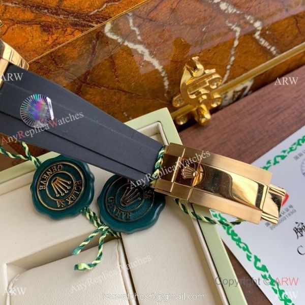 New Copy Rolex Daytona Rubber Strap Black Dial with Gold Subdials New Copy Rolex Daytona Rubber Strap Black Dial with Gold Subdials