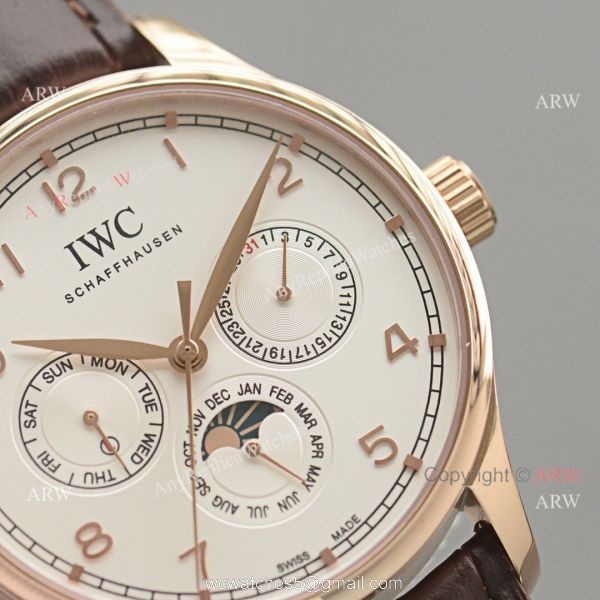 Replica IWC Portuguese Moonphase Gold Case White Face Watch Replica IWC Portuguese Moonphase Gold Case White Face Watch