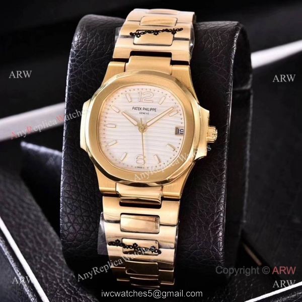 Copy Patek Philippe Nautilus Womens Yellow Gold and Blue Swiss Quality Copy Patek Philippe Nautilus Womens Yellow Gold and Blue Swiss Quality