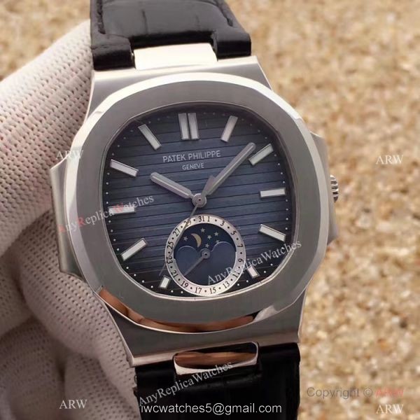 Swiss Grade 1 Patek Philippe Moonphase Replica Watch Nautilus Black Dial 40mm Swiss Grade 1 Patek Philippe Moonphase Replica Watch Nautilus Black Dial 40mm