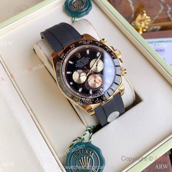 New Copy Rolex Daytona Rubber Strap Black Dial with Gold Subdials New Copy Rolex Daytona Rubber Strap Black Dial with Gold Subdials