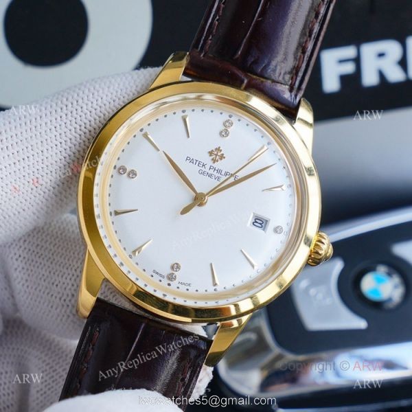 New Patek Philippe Calatrava Replica Watch Gold Dial With Brown Leather Band New Patek Philippe Calatrava Replica Watch Gold Dial With Brown Leather Band