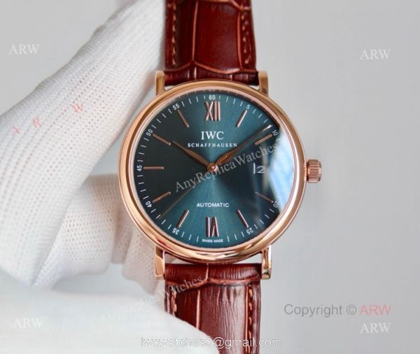 High Quality IWC Portofino Rose Gold Blue Dial Automatic Replica Watch High Quality IWC Portofino Rose Gold Blue Dial Automatic Replica Watch