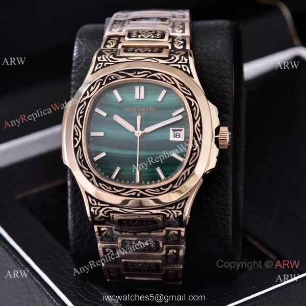 Clone Patek Philippe Nautilus Gold Tattoo Wrist Malachite Green Dial Clone Patek Philippe Nautilus Gold Tattoo Wrist Malachite Green Dial
