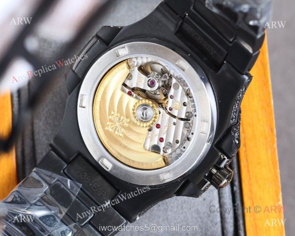 Swiss Grade One Patek Philippe Nautilus Iced Out 9015 Watch Solid Black Swiss Grade One Patek Philippe Nautilus Iced Out 9015 Watch Solid Black
