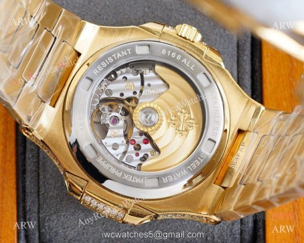 Swiss AAA Replica Patek Philippe Nautilus Iced Out Yellow Gold Watch 40mm 9015 Ultra-thin Movement Swiss AAA Replica Patek Philippe Nautilus Iced Out Yellow Gold Watch 40mm 9015 Ultra-thin Movement