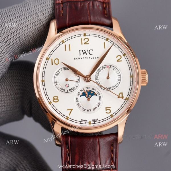 Fake IWC Portuguese Moonphase Rose Gold Case 42MM Brown Leather Strap Watch Fake IWC Portuguese Moonphase Rose Gold Case 42MM Brown Leather Strap Watch
