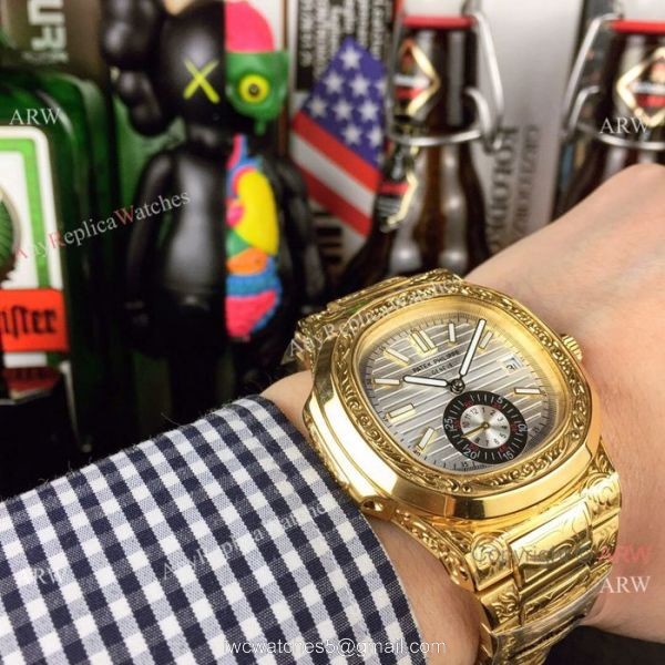 New Fake Patek Philippe Engraving Nautilus Silver Face Yellow Gold Watch For Sale