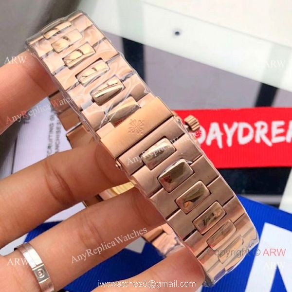 Swiss Replica Patek Philippe Nautilus 5711 Rose Gold Blue Watches