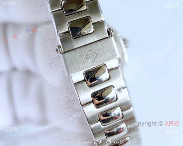 Swiss Replica Patek Philippe Ladies Nautilus Watch Diamond Bezel