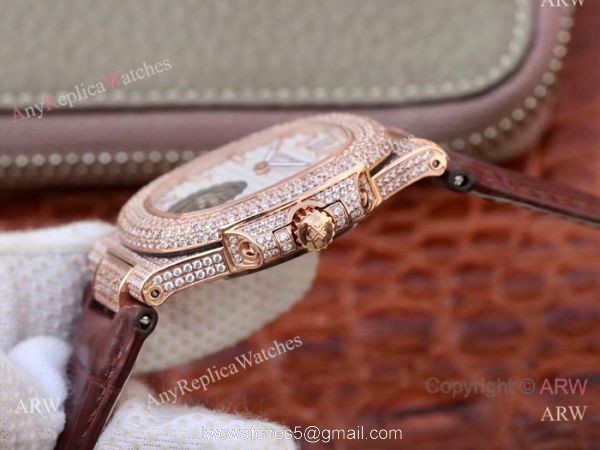 Swiss Replica Patek Philippe Nautilus Jumbo R8 Watch Rose Gold Iced Out