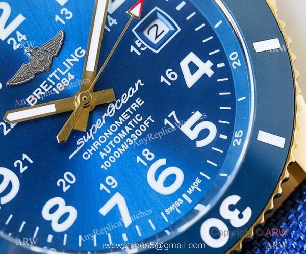 Swiss Breitling Superocean II Mens Watch Yellow Gold Blue Ceramic Bezel