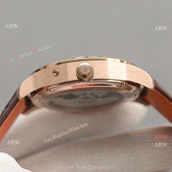 Replica IWC Portuguese Moonphase Gold Case White Face Watch