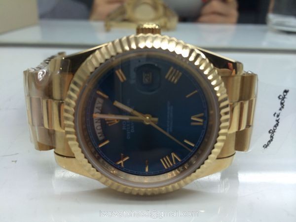 Replica Rolex Day-Date 40mm Gold Roman Dial Watch Luminous Markers Replica Rolex Day-Date 40mm Gold Roman Dial Watch Luminous Markers