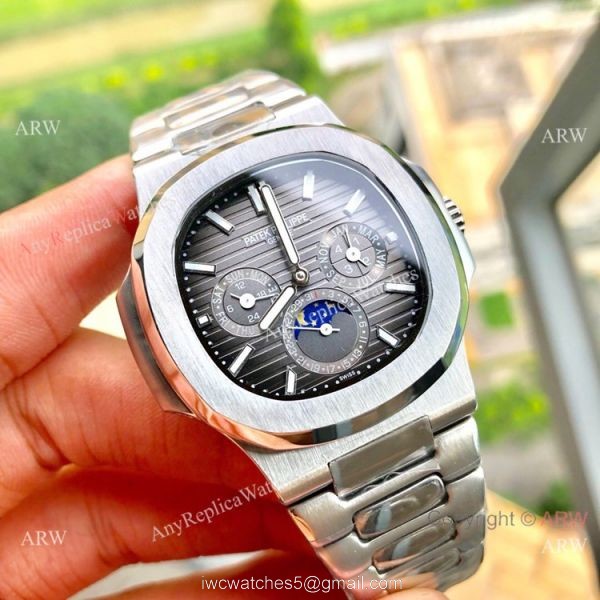 New Patek Philippe Nautilus Annual Calendar Moonphase Watch SS White Dial 42 MM New Patek Philippe Nautilus Annual Calendar Moonphase Watch SS White Dial 42 MM