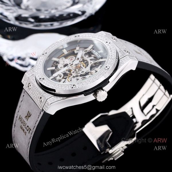 Replica Hublot Big Bang 45mm Skeleton Watch With Diamonds Blue Rubber Band For Men Replica Hublot Big Bang 45mm Skeleton Watch With Diamonds Blue Rubber Band For Men