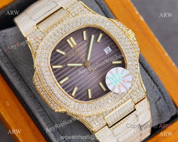 Swiss AAA Replica Patek Philippe Nautilus Iced Out Yellow Gold Watch 40mm 9015 Ultra-thin Movement Swiss AAA Replica Patek Philippe Nautilus Iced Out Yellow Gold Watch 40mm 9015 Ultra-thin Movement