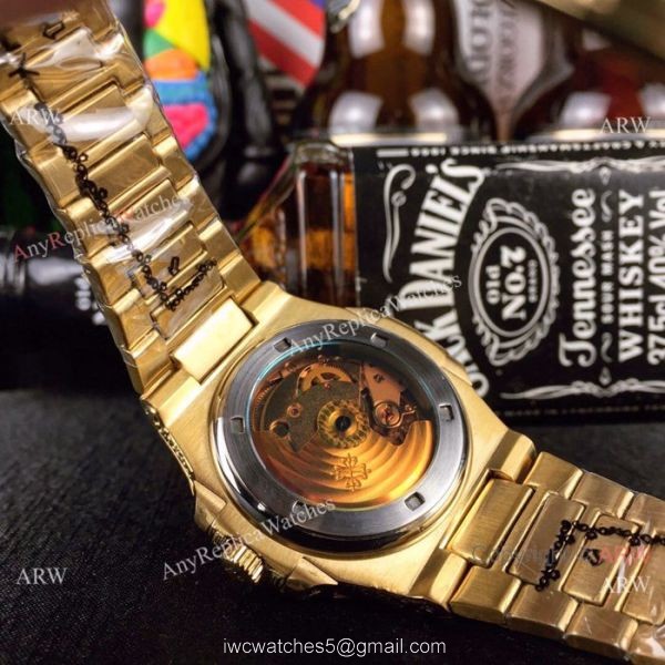 New Fake Patek Philippe Engraving Nautilus Silver Face Yellow Gold Watch For Sale