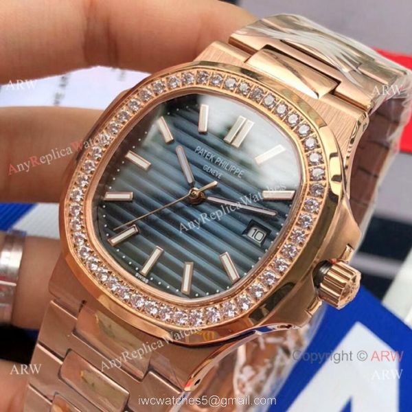 Swiss Replica Patek Philippe Nautilus 5711 Rose Gold Blue Watches