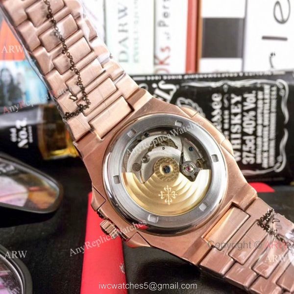 Clone Patek Philippe Nautilus White Face Rose Gold Tattoo Watch 40mm