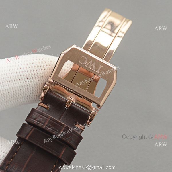 Replica IWC Portuguese Moonphase Gold Case White Face Watch