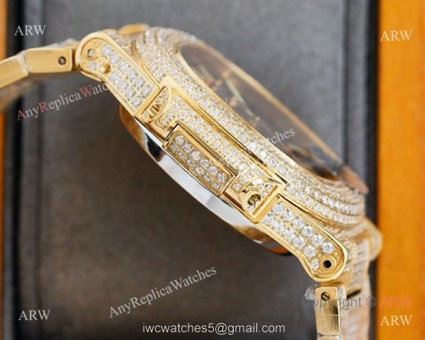 Swiss AAA Replica Patek Philippe Nautilus Iced Out Yellow Gold Watch 40mm 9015 Ultra-thin Movement